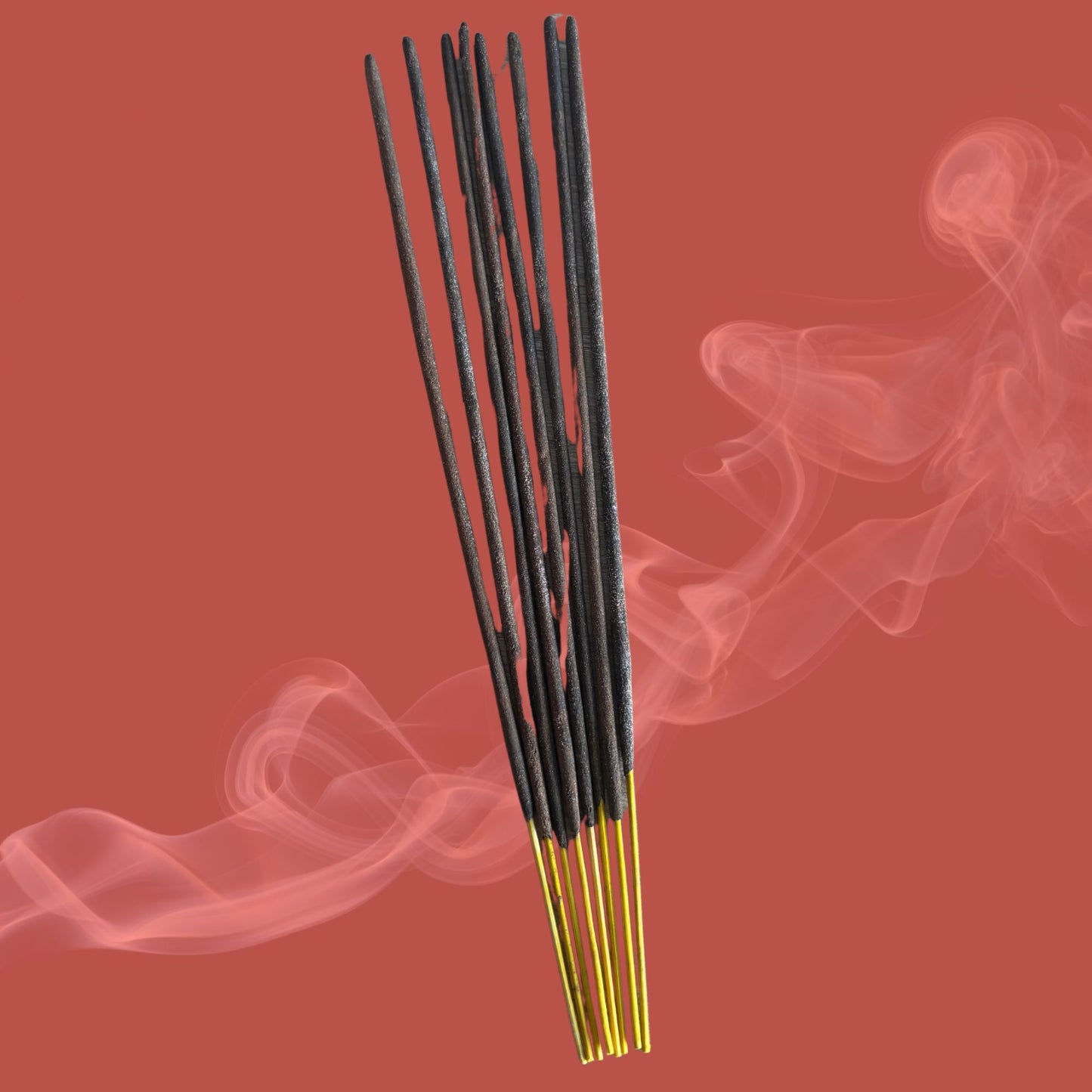 Incense sticks with smoke on a red background