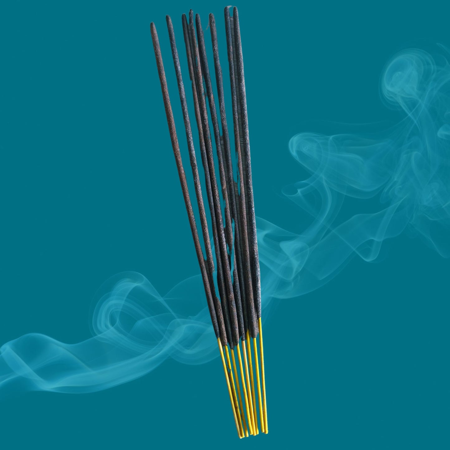 Incense sticks with smoke on a teal background